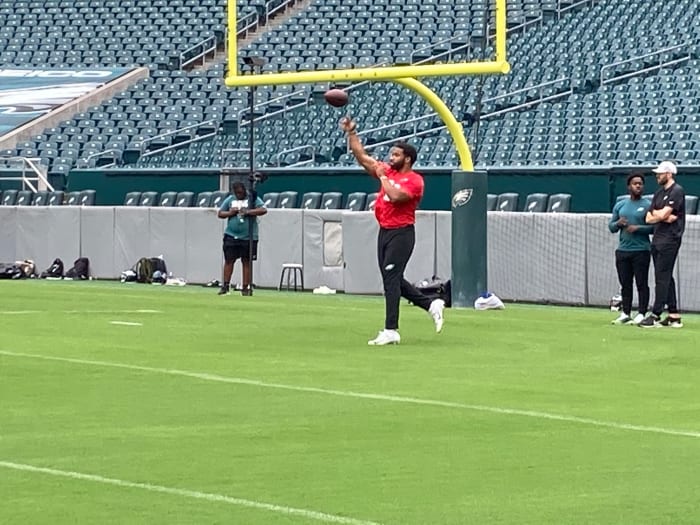 Eagles QB Jamie Newman gets loose prior to practice on June 4, 2021